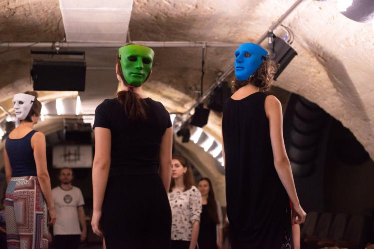 Actors wearing masks during the Pulse of the City project performance