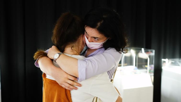 Embrace of two women in Ukraine